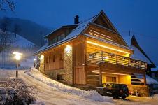 Chalet by night in wintertime